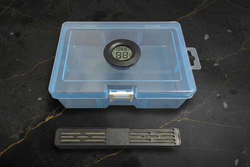 Box con igrometro su sfondo marmo